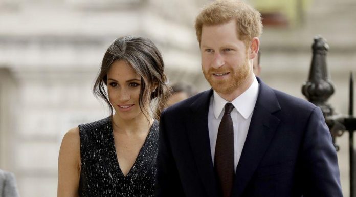 Queen Elizabeth II formally signs Instrument of Consent, approving royal wedding