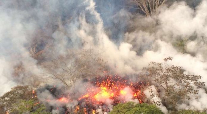 Hawaii community clings to life in shadow of fiery volcano