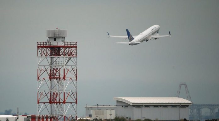 Nigerian woman removed from United Airlines flight after white male passenger told crew she smelled bad