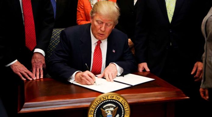 White House tasks office with taping together papers after Trump rips them up: report