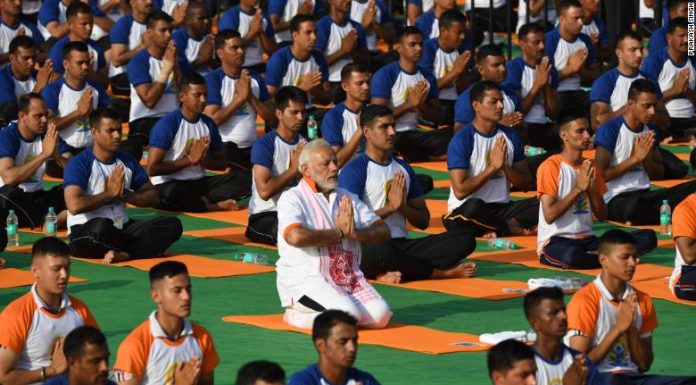 International Yoga Day: India takes a deep breath with Modi on the mat