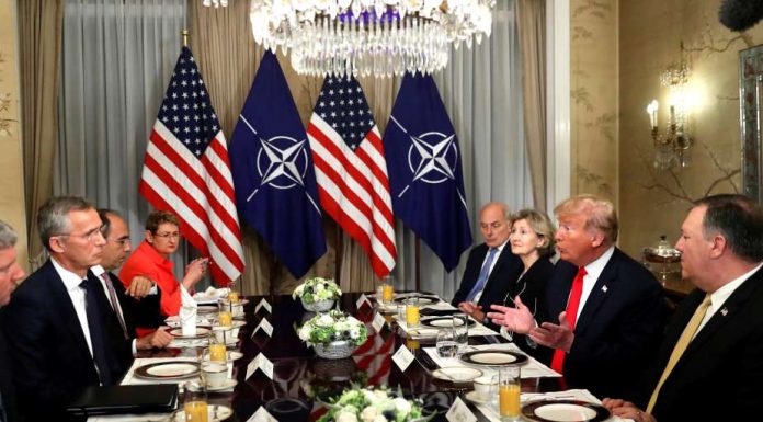 German Chancellor Angela Merkel hits back at Donald Trump at NATO summit