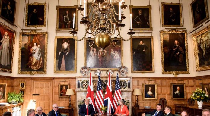 US President Trump praises British Prime Minister May one day after report criticizing her approach to Brexit
