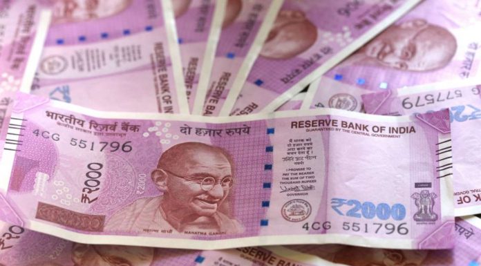 Is China printing the Indian rupee?