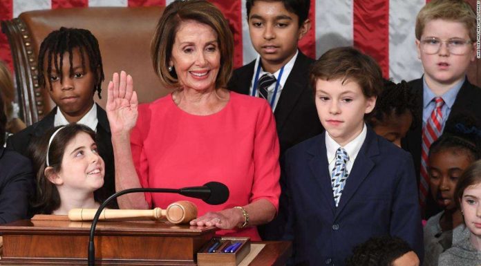 Pelosi takes speaker’s oath surrounded by children