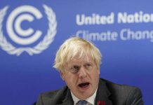 Britain’s Prime Minister Boris Johnson draws criticism for plans to fly home from Glasgow climate summit