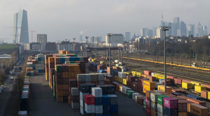 Dow tumbles more than 800 points and dollar slides over Greenland and tariff threats